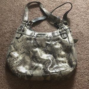 Snakeskin coach purse